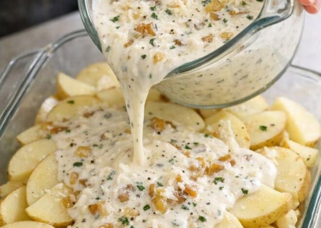 creamy pour-over over potatoes into a glass casserole